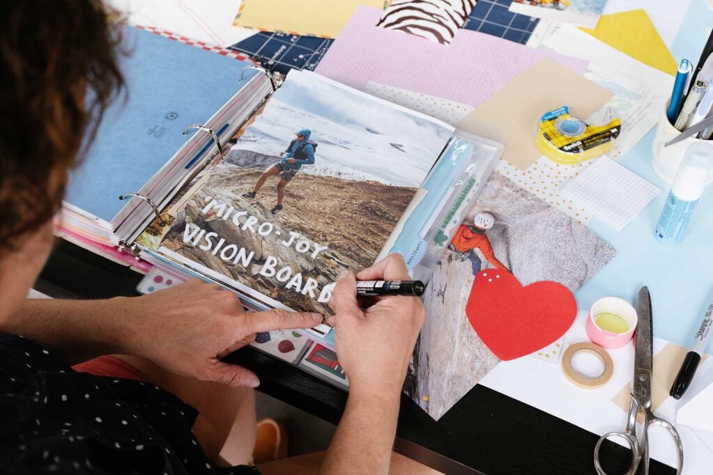 Lindsay working on a page of the junk journal in her studio